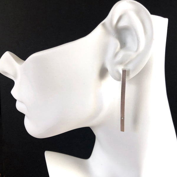 Silver bar post earrings with gemstones by eko jewelry design, Fenella on model
