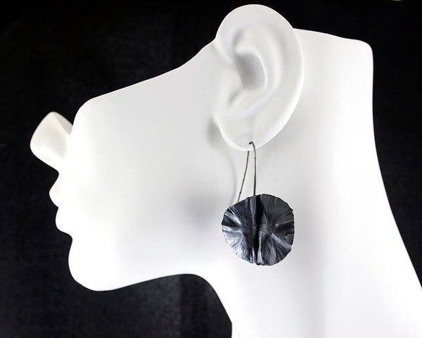 Silver leaf earrings by eko jewelry design, Shasta on model