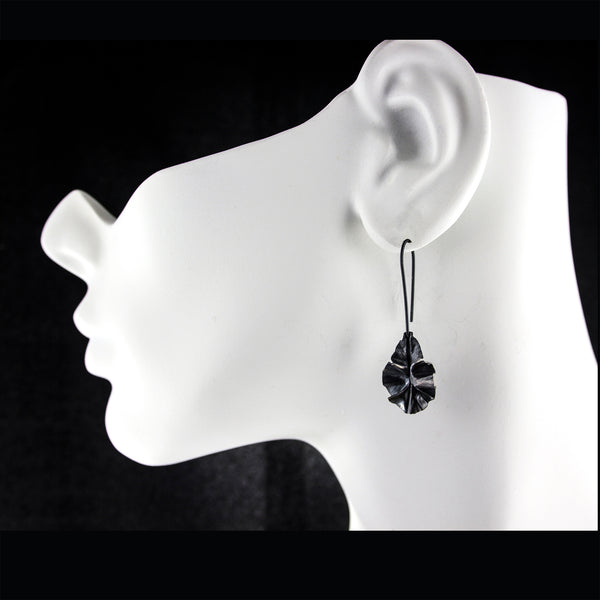 Sterling silver leaf earrings by eko jewelry design, Sierra on model