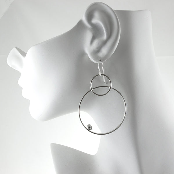 large sterling silver hoop earrings with gemstones by eko jewelry design, Stavra on model
