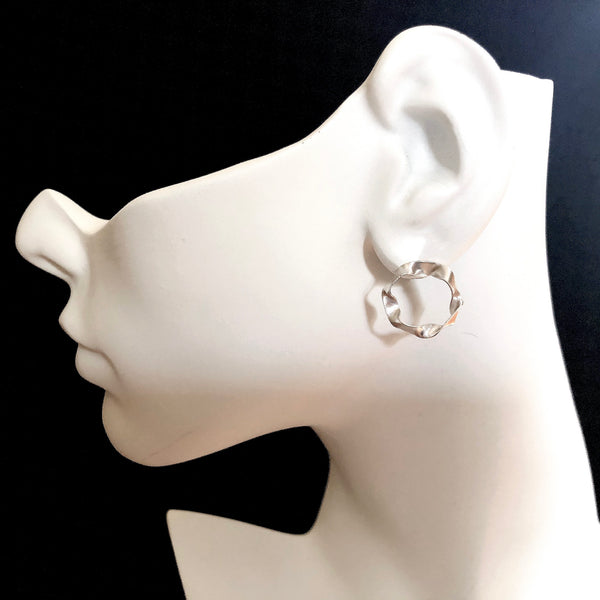 sterling silver hoop stud earrings by eko jewelry design, Anora on model