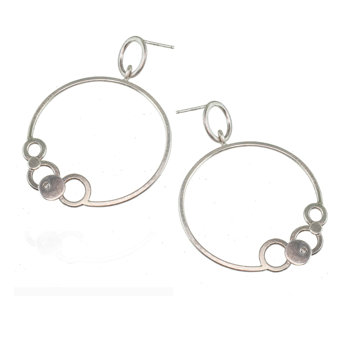 Silver minimal jewelry with flush set diamonds by eko jewelry design