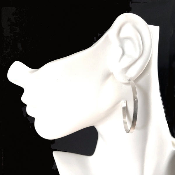 Large sterling silver hoop stud earrings with gemstones by eko jewelry design, Novella on model