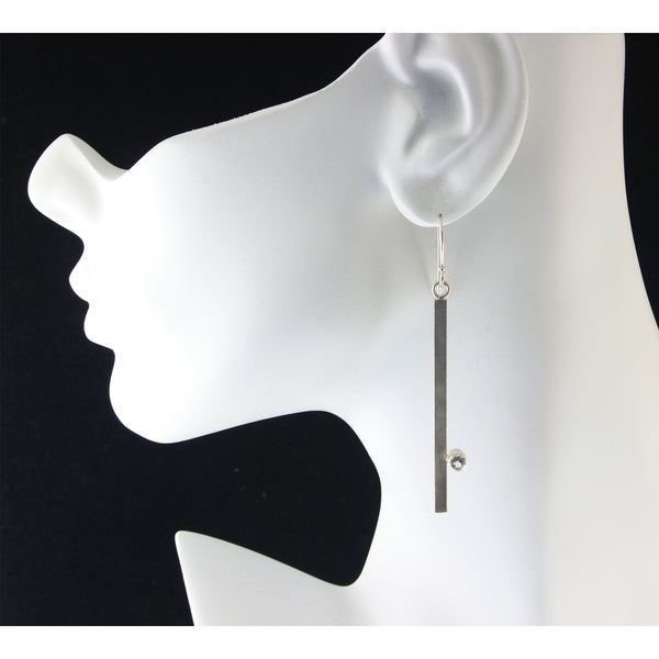 Long silver bar earrings with gemstones by eko jewelry design, Pilar on model
