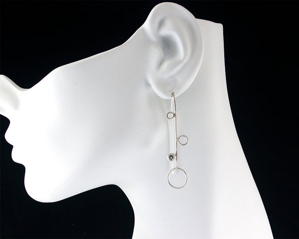 Multi circle silver threader earrings with gemstones by eko jewelry design, Capriana on model