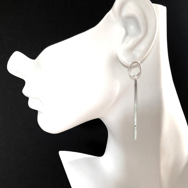 Silver bar post earrings with gemstones by eko jewelry design, Belen on model