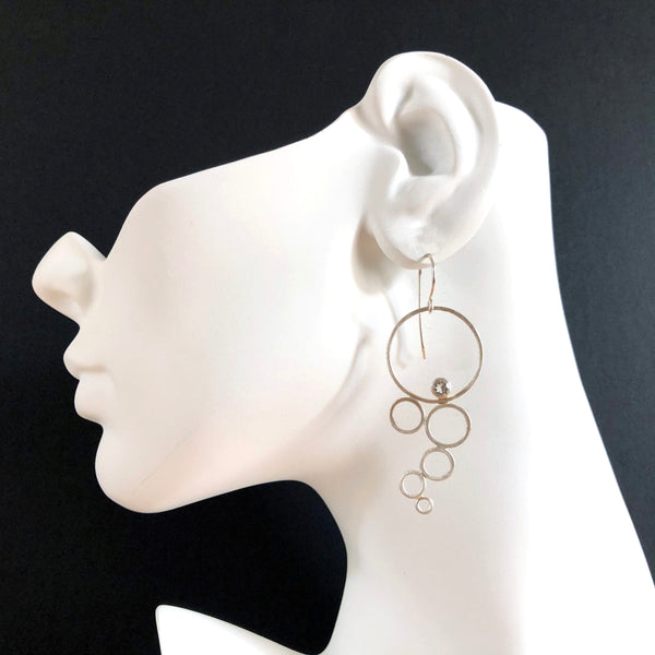 Sterling silver multi circle earrings with gemstones by eko jewelry design, Irmina on model