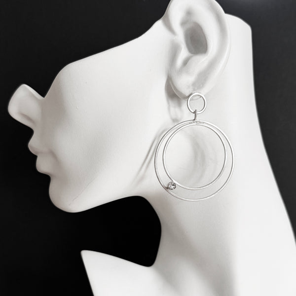 silver hoop jewelry with gemstones by eko jewelry design, Leighton on model