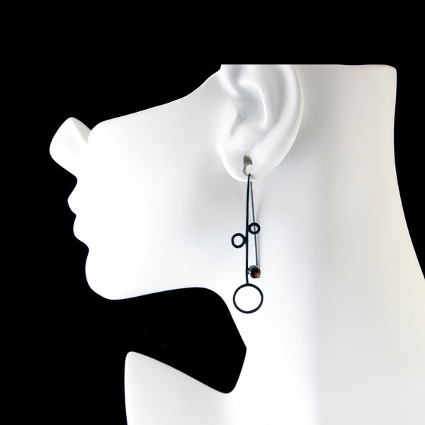 Multi circle silver threader earrings with garnet by eko jewelry design,Caprice on model