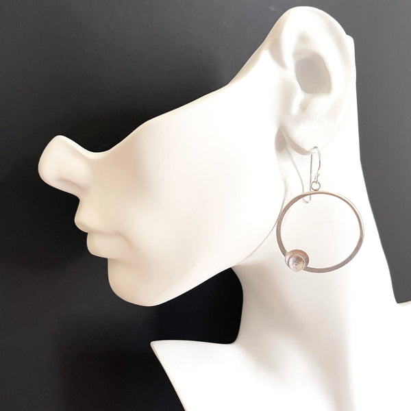 silver leaf hoop earrings with diamonds by eko jewelry design, Jordina on model
