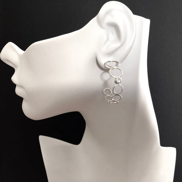 silver bubble hoop earrings with gemstones by eko jewelry design, Allumina on model