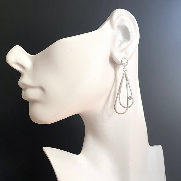silver double teardrop earrings with gemstones by eko jewelry design, Gemina on model