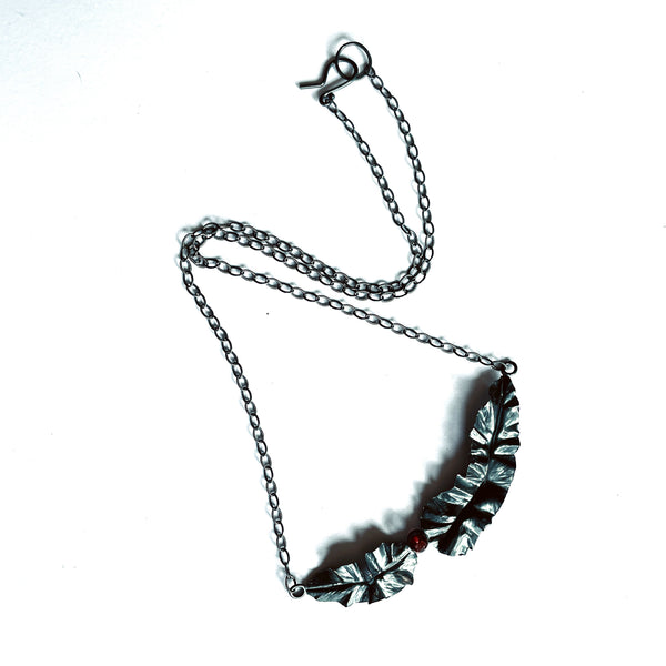 silver leaf necklace with garnet with clasp by eko jewelry design, Bren