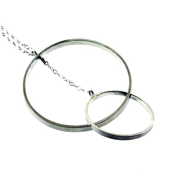 Intersecting large sterling silver hoop necklace by eko jewelry design