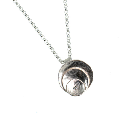 Round silver necklace with a diamond by eko jewelry design, Luvina