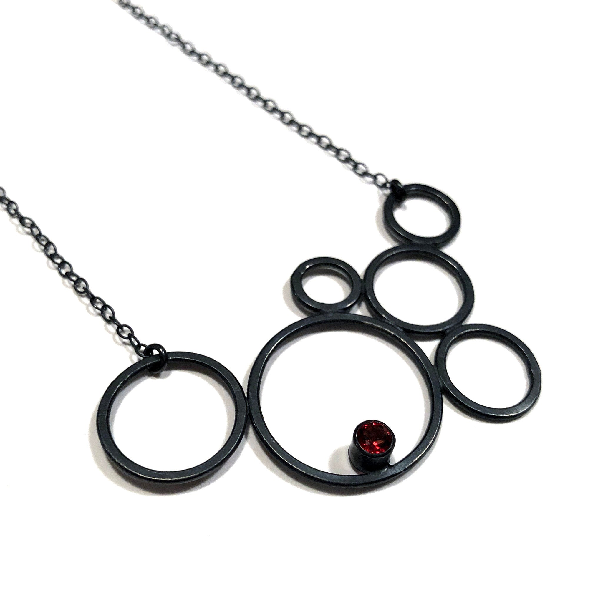 sterling silver circle necklace with garnet by eko jewelry design, Zefira